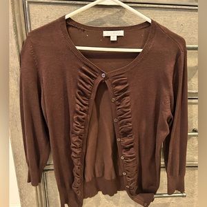 Brown, quarter length sleeve with ruffle in front